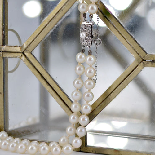 Collier Collier de perles blanches double rang 58 Facettes 21-129