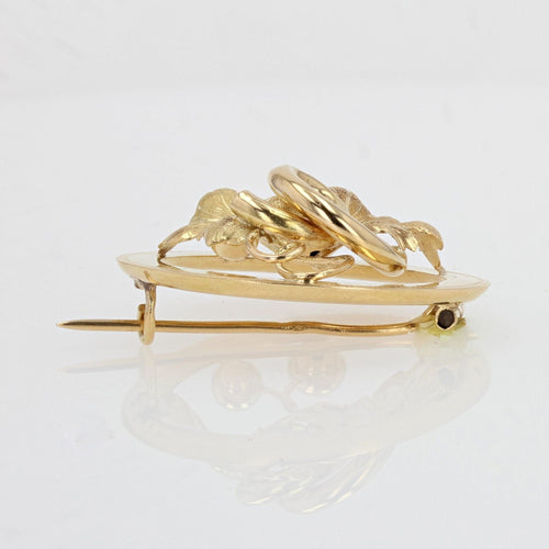 Broche Broche ancienne en or à décor de feuille de vigne 58 Facettes 13-052B