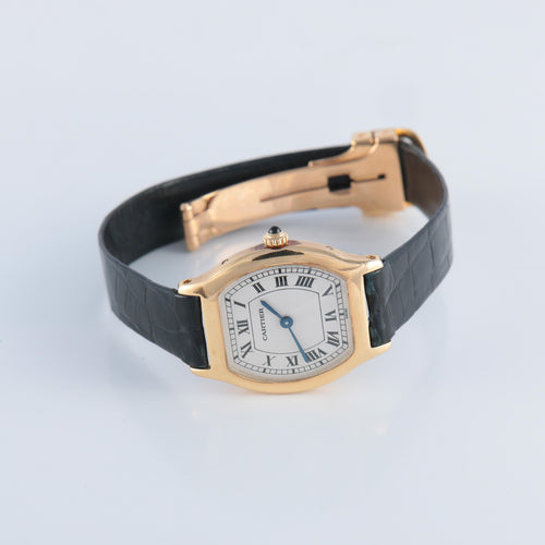 Montre Montre Cartier or jaune modèle tortue 58 Facettes