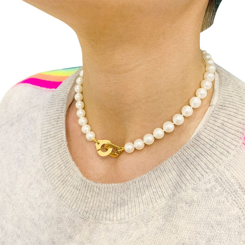 Collier Collier de perles Dinh Van, "Menottes R15", en or jaune. 58 Facettes 32600