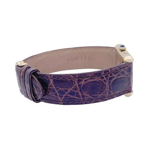 Montre Montre Cartier "Tank Must" argent plaqué or, cadran laqué marron. 58 Facettes 33541