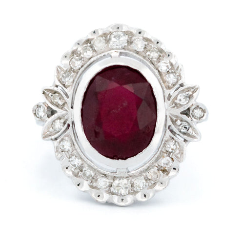 Bague 55.5 Bague rubis entourage diamants 58 Facettes 71B6100F25574B948979BEE5BAEE5E92