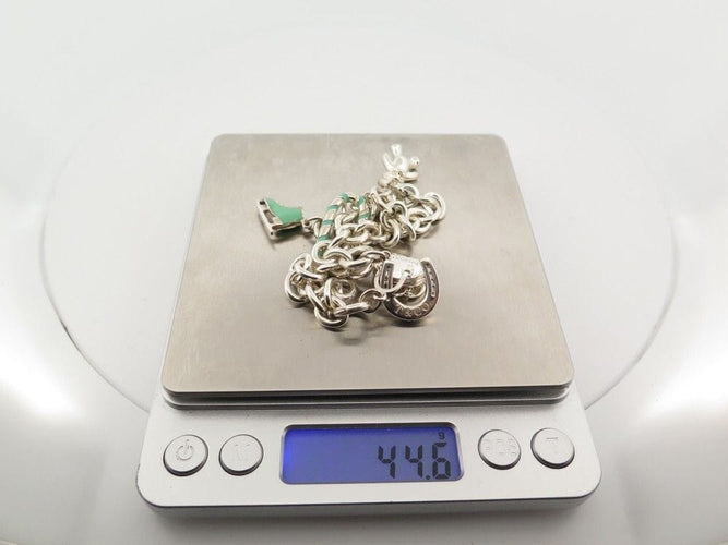 Bracelet bracelet TIFFANY & CO chaine a breloques charms 19 argent 58 Facettes 254453