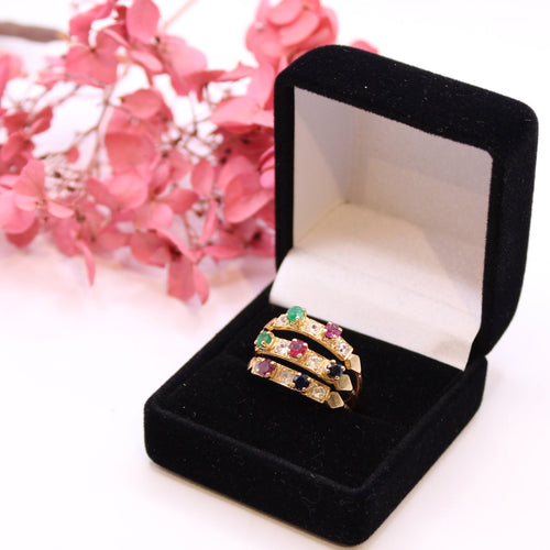 Bague Bague émeraudes, saphirs, rubis et pierre blanches 58 Facettes