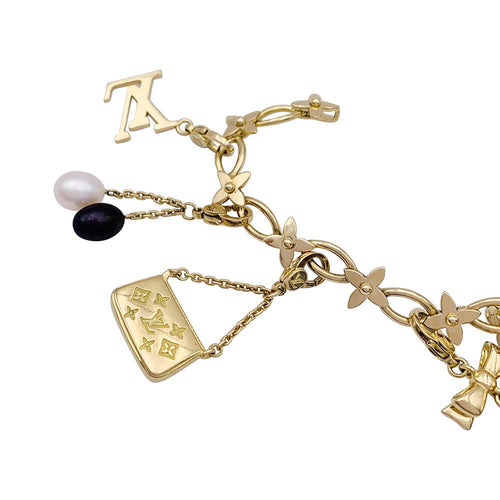 Bracelet Bracelet Louis Vuitton, "Idylle", breloques, or jaune, or blanc, perles. 58 Facettes 33013
