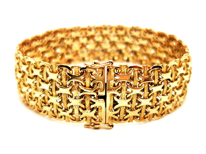 Bracelet Bracelet Manchette Or jaune 58 Facettes 1468044CN