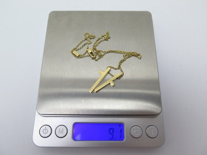 Collier collier GUCCI croix fendue 39 a 47 cm en or jaune 18k 58 Facettes 248967