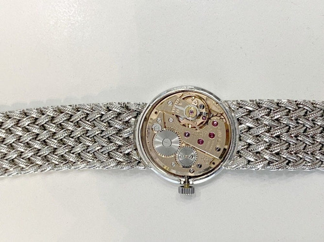 Montre vintage montre BOUCHERON mvt omega 21mm mecanique or gris 18k et diamants 58 Facettes 241077