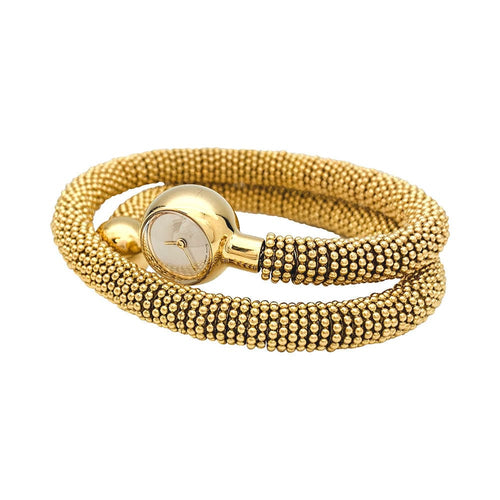 Montre Montre Van Cleef & Arpels "Liane Serpent" trois tours en or jaune. 58 Facettes 30892