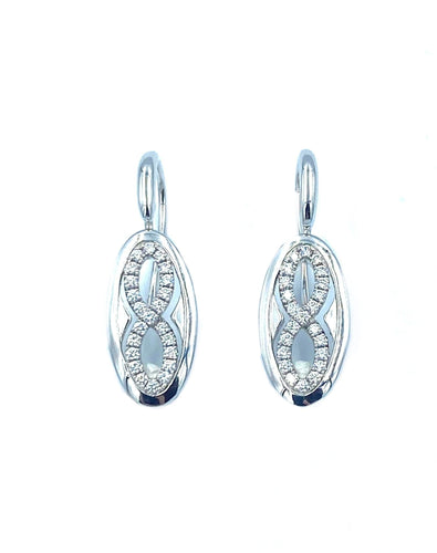 Boucles d'oreilles Bucherer. Boucles d’oreilles or blanc et diamants 58 Facettes