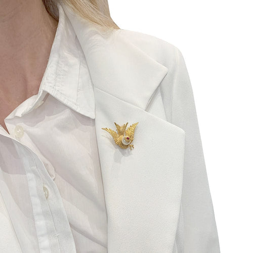 Broche Broche oiseau en or jaune, rubis, perle. 58 Facettes 32229