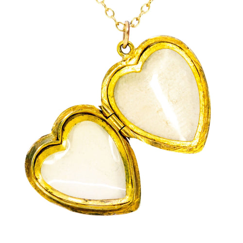 Pendentif Médaillon porte-photo ancien or 9ct 58 Facettes 8CC666F08E8B4F71865E6DC56534E8D0