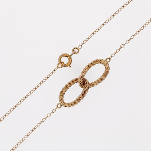 Collier Collier or jaune boucles entrelacées 58 Facettes 23-216
