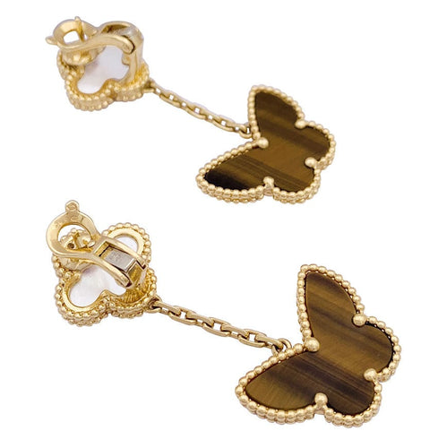 Boucles d'oreilles Boucles d'oreilles Van Cleef & Arpels "Lucky Alhambra" or jaune, nacre blanche, oeil de tigre. 58 Facettes 33555