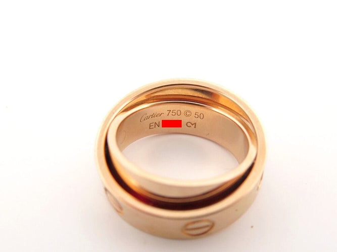Bague 50 bague CARTIER double love en or rose 18k pendentif 58 Facettes 256980