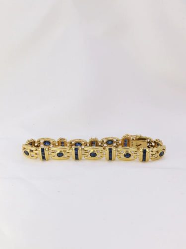 Bracelet Bracelet en or et saphirs ovales et calibrés 58 Facettes J224