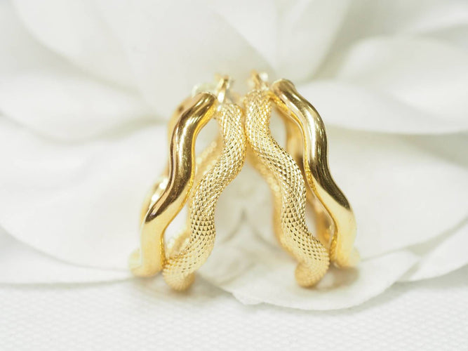Boucles d'oreilles Boucles d'oreilles créoles double tube en or jaune 58 Facettes 19452