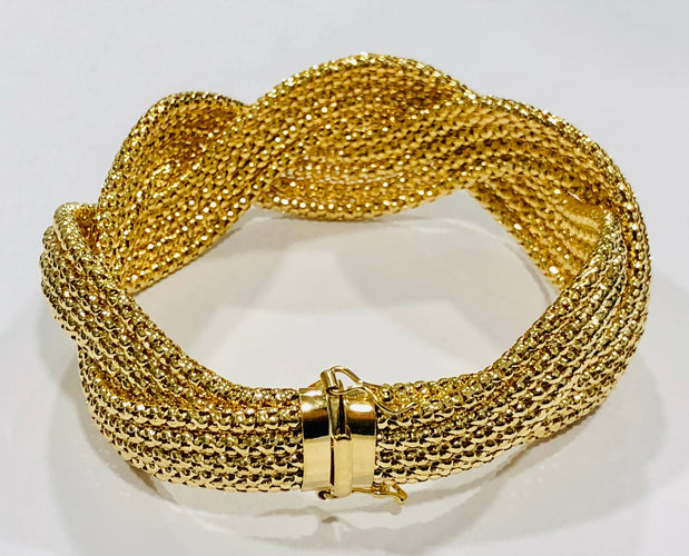 Bracelet Lumineux bracelet tressé en or jaune 58 Facettes