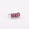 Bague 55 Bague Jarretière, rubis et diamants 58 Facettes