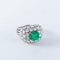 Bague Bague en platine, émeraude et diamants 58 Facettes