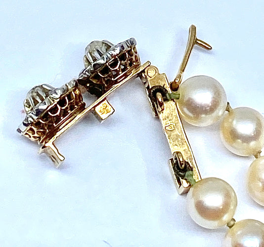 Collier Double collier de perles fermoir diamants. 58 Facettes AB170