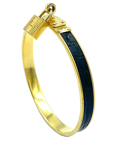 Bracelet Hermès. Bracelet Kelly métal doré et cuir 58 Facettes