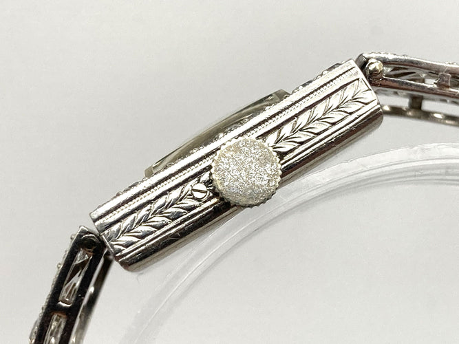 Montre Montre Art Déco platine & or blanc, diamants 2.44 cts 58 Facettes 07/07 - 16