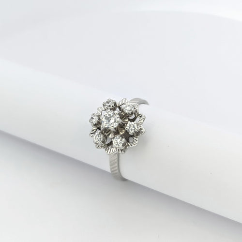 Bague Bague marguerite en or blanc et diamants 58 Facettes 25485