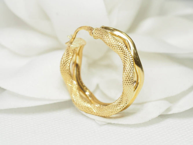 Boucles d'oreilles Boucles d'oreilles créoles double tube en or jaune 58 Facettes 19452