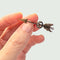 Broche Petite broche début SXX en or 18 carats et perles 58 Facettes Q981A