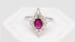 Bague Bague marquise en or blanc, rubis et diamants navette 58 Facettes 29917