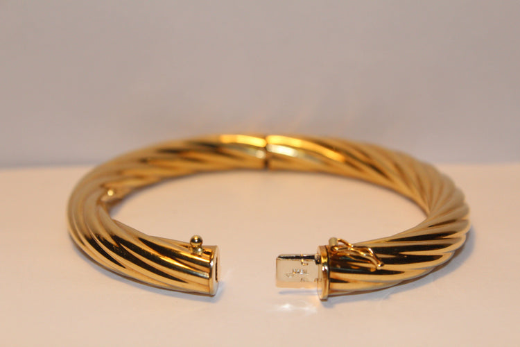 Bracelet Bracelet Torsade Or jaune 58 Facettes 11047A
