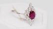 Bague Bague marquise en or blanc, rubis et diamants navette 58 Facettes 29917