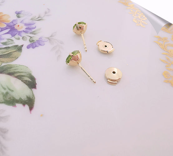 Boucles d'oreilles Clous d'oreilles Péridots Ø 6 mm 58 Facettes AA 1506