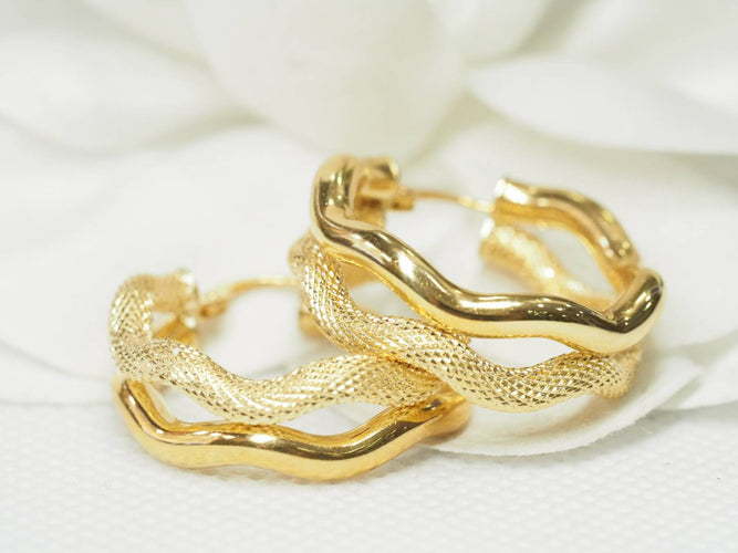 Boucles d'oreilles Boucles d'oreilles créoles double tube en or jaune 58 Facettes 19452