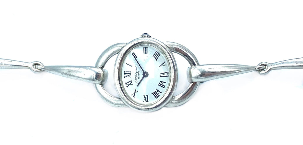 Montre CHOPARD. Montre vintage argent et mouvement mécanique 58 Facettes