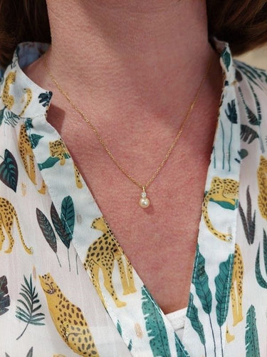 Collier Collier en or jaune, perle, diamant 58 Facettes 063481
