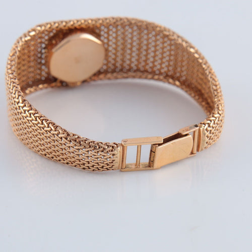 Montre Montre en or jaune 58 Facettes