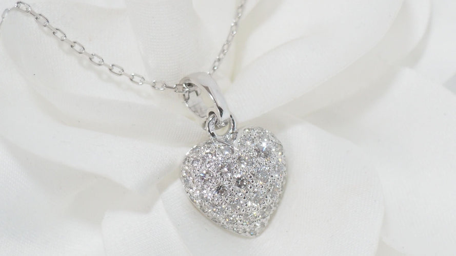 Collier Collier Cartier pendentif cœur, or blanc et diamants 58 Facettes 13807