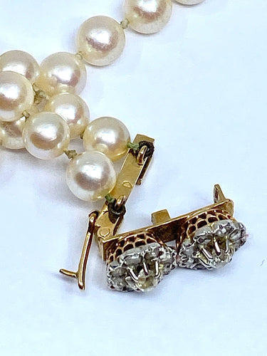 Collier Double collier de perles fermoir diamants. 58 Facettes AB170