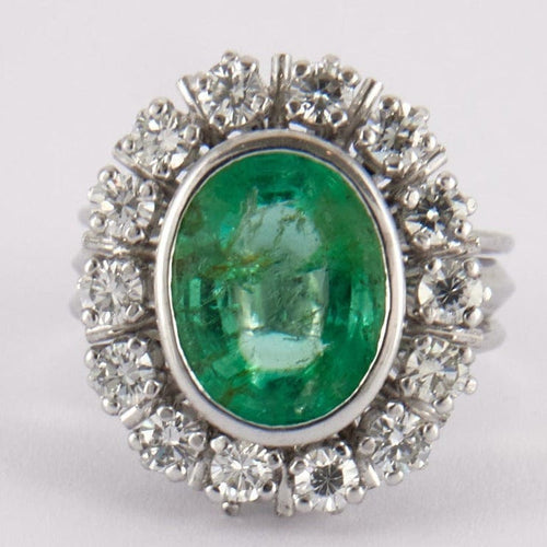 Bague 49 Bague Marguerite en or gris, émeraude, diamants 58 Facettes