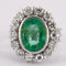 Bague 49 Bague Marguerite en or gris, émeraude, diamants 58 Facettes