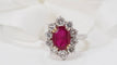 Bague Bague marguerite or blanc rubis ovale et diamants 58 Facettes 30987