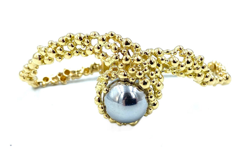Bracelet GILBERT ALBERT. Bracelet en or jaune et billes interchangeables 58 Facettes
