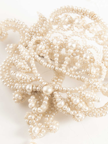 Broche Broche forme noeud en perles fines sur nacre 58 Facettes