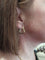 Boucles d'oreilles Créoles modernes triangulaires 58 Facettes 062431
