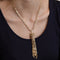 Collier Collier pendentif, or jaune tête de panthère 58 Facettes