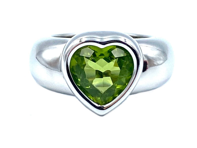 Bague PIAGET. Bague or blanc 18K et péridot 58 Facettes