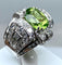 Bague Bague Art Déco Platine diamants et péridot 58 Facettes