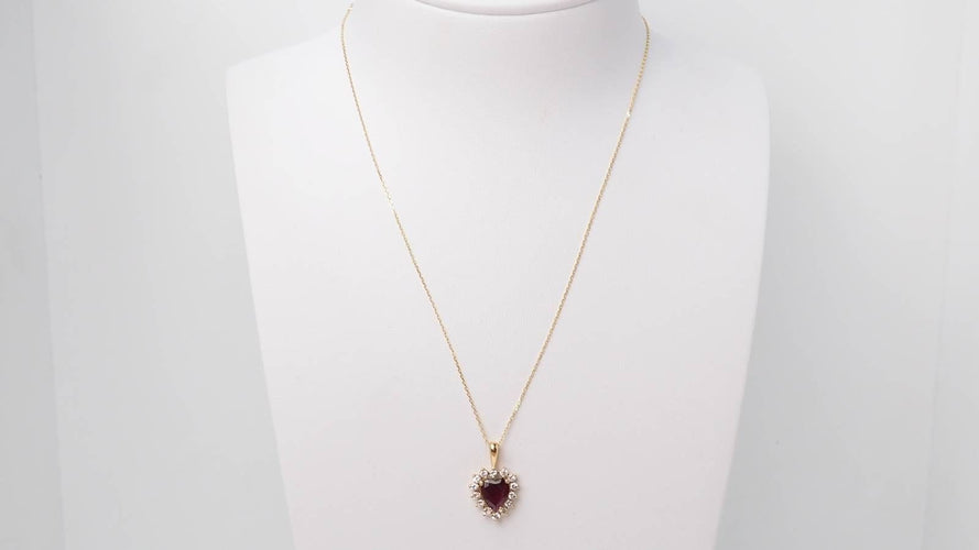 Collier Collier pendentif coeur or jaune, diamants et rubis 58 Facettes 32536